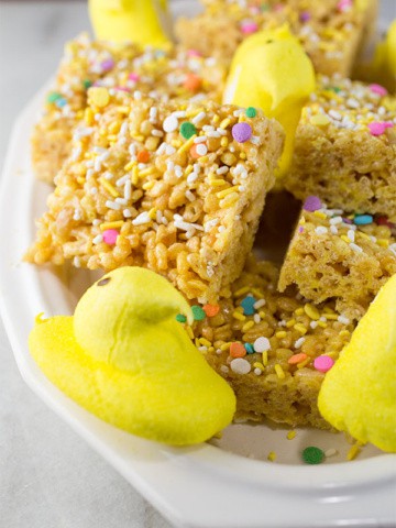 Krispie Treats with Sprinkles and Yellow Marshmallow Peeps on Platter.