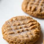 Peanut butter cookie sprinkled with granulated sugar.