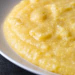 Instant Pot Polenta in white bowl.