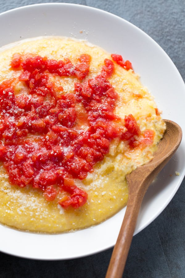 Instant pot with simple tomato sauce on a white platter.