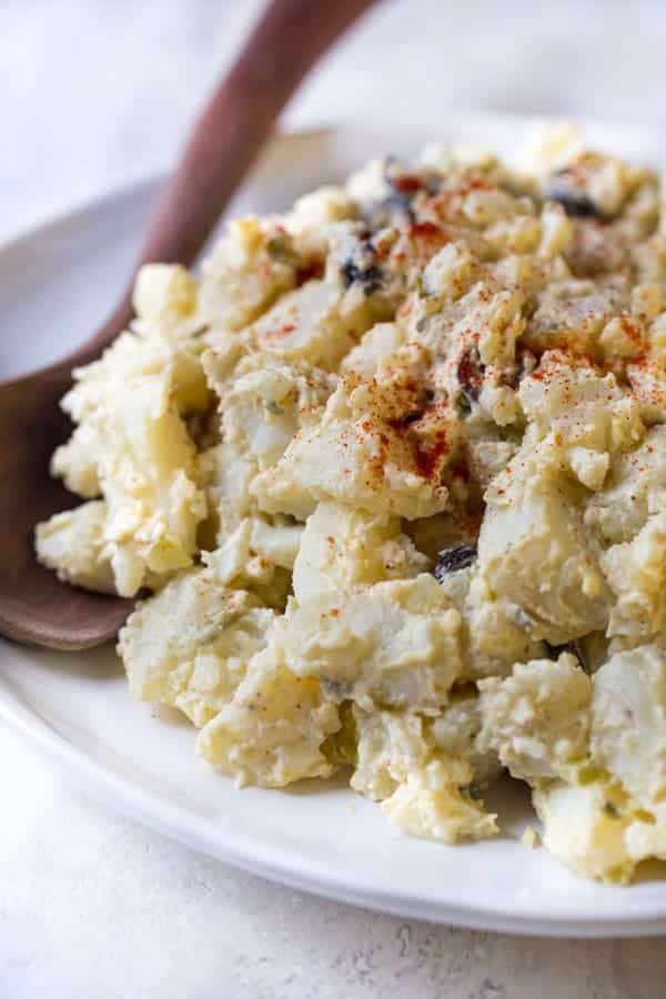 Potato salad on white plate.