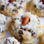 Baked coconut macaroon topped with an almond.