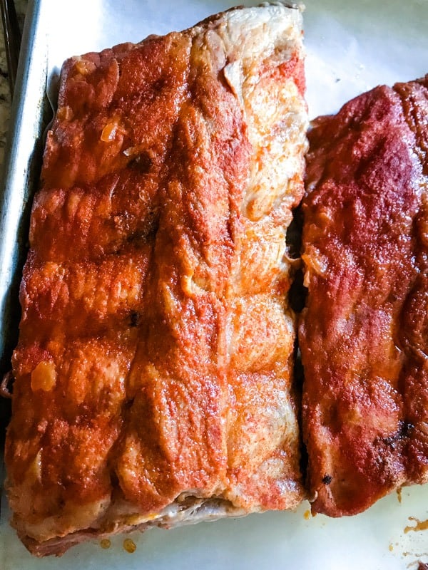 Cooked Instant Pot Ribs on a baking sheet. 