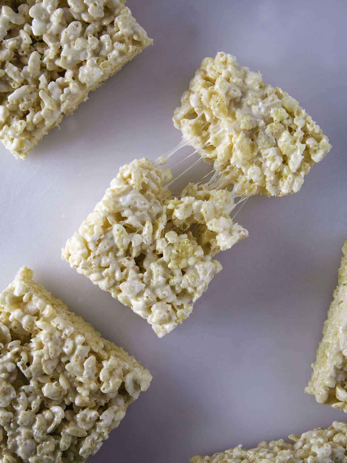 Rice Krispie Treat broken in half to show texture.