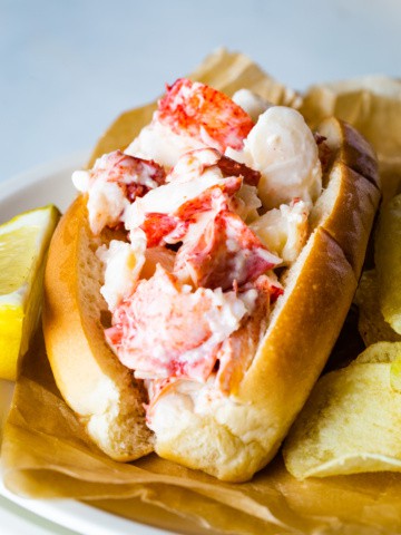 Lobster roll on a plate.