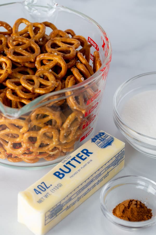 Ingredients for cinnamon sugar pretzel recipe. Pretzels. Stick of butter. Sugar. Cinnamon.