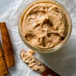 Cinnamon honey butter in a glass container.