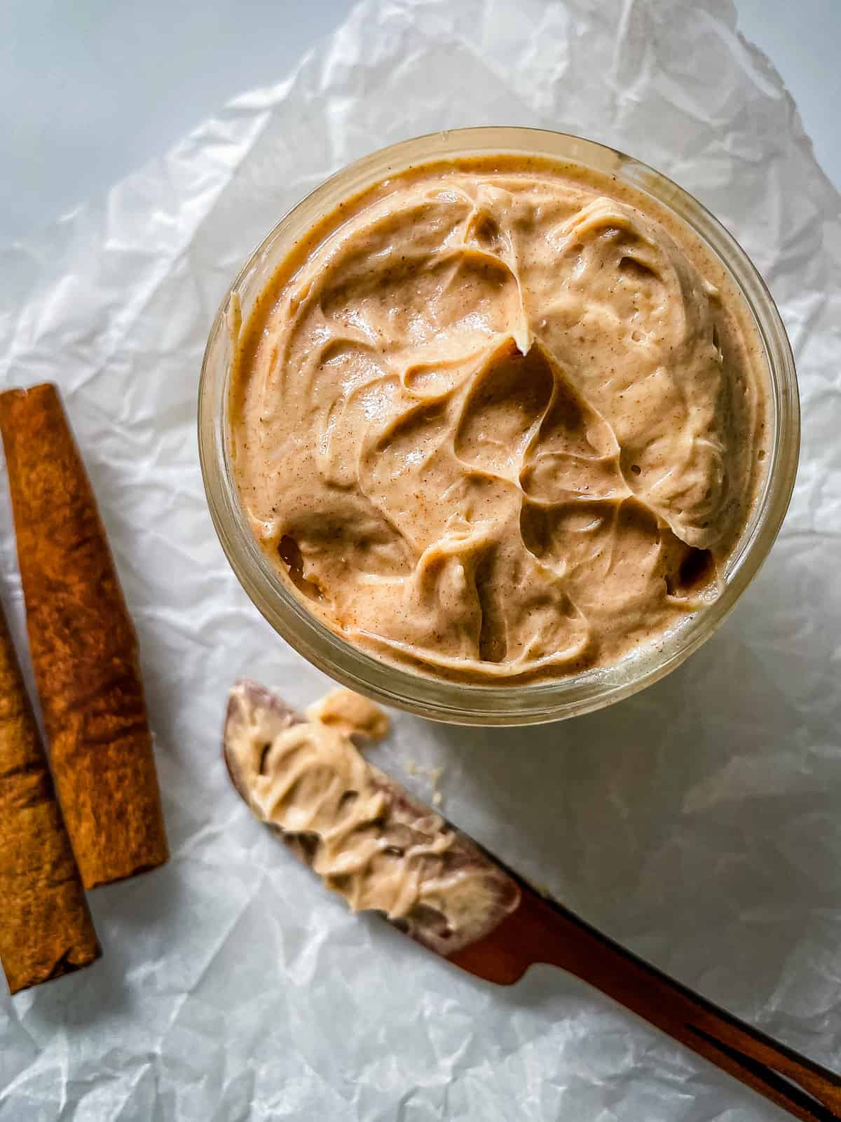 Cinnamon honey butter in a glass container.