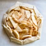 Apple galette on baking sheet.
