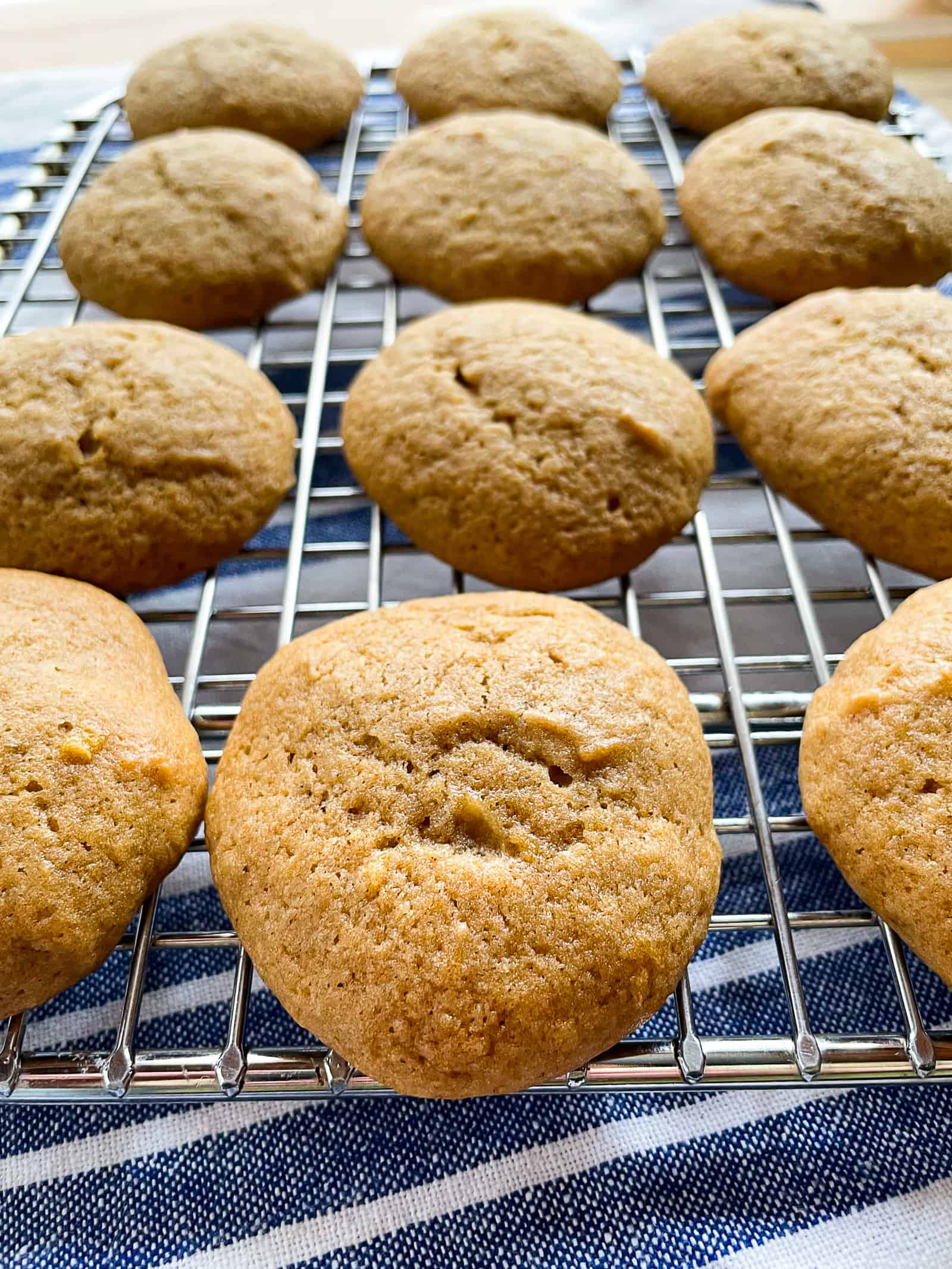 Soft banana cookies cooling on a wire rack.