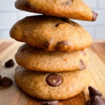 A stack of soft banana cookies with chocolate chips.