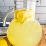 Homemade lemonade in a glass pitcher.