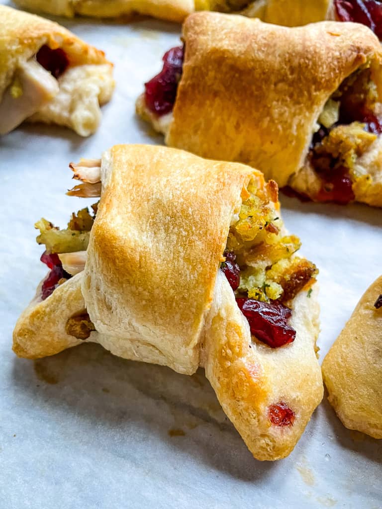 Baked gobbler rollup on a baking sheet.