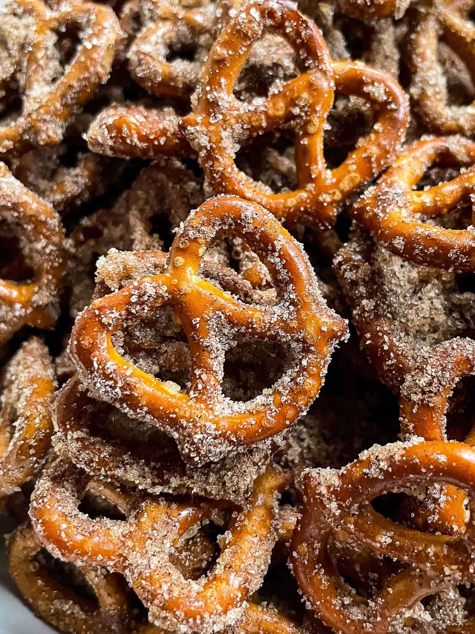 Cinnamon sugar pretzels in a pile. 