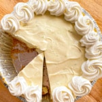 No-bake lime pie topped with a border of whipped cream rosettes.