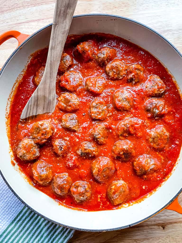 Baked meatballs in pasta sauce.