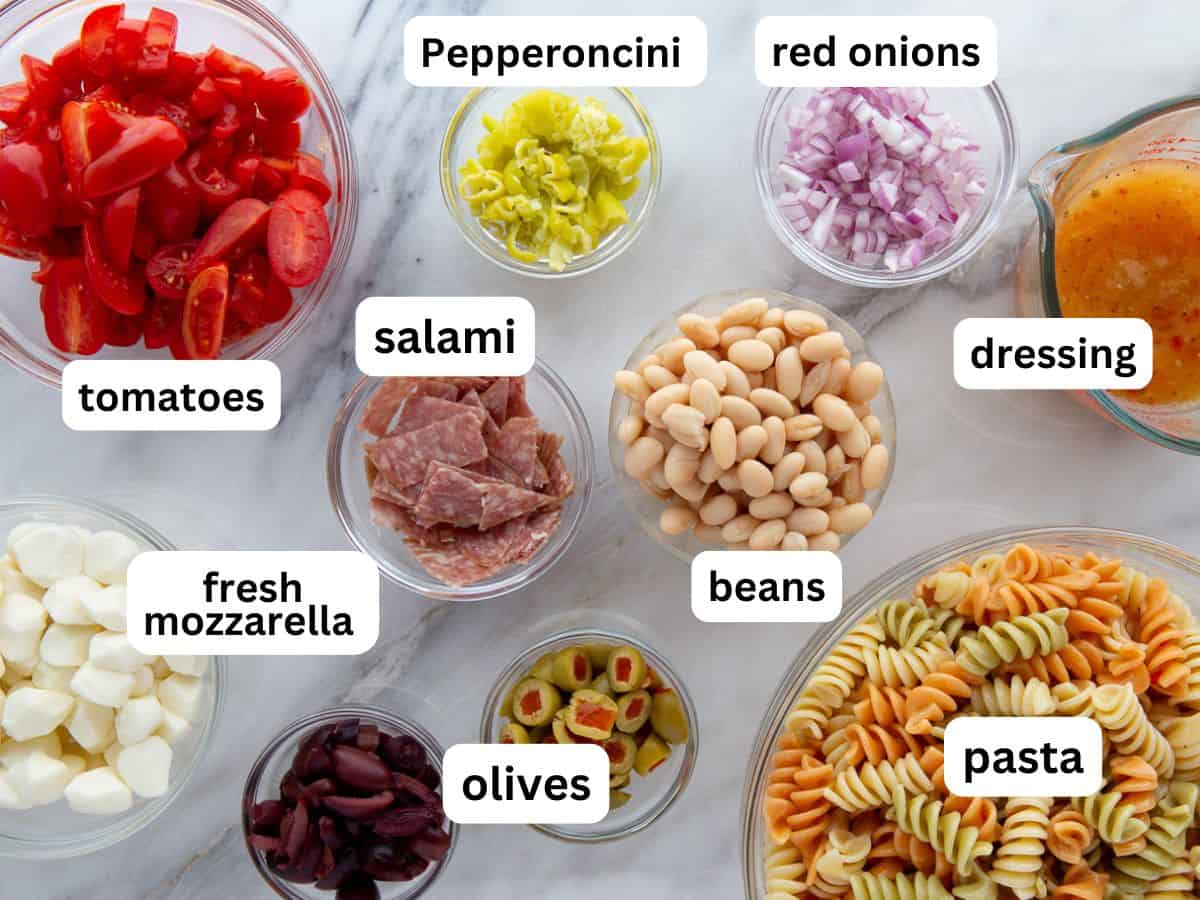 Ingredients for antipasto salad on the counter.
