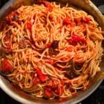 Pasta puttanesca in a pan.