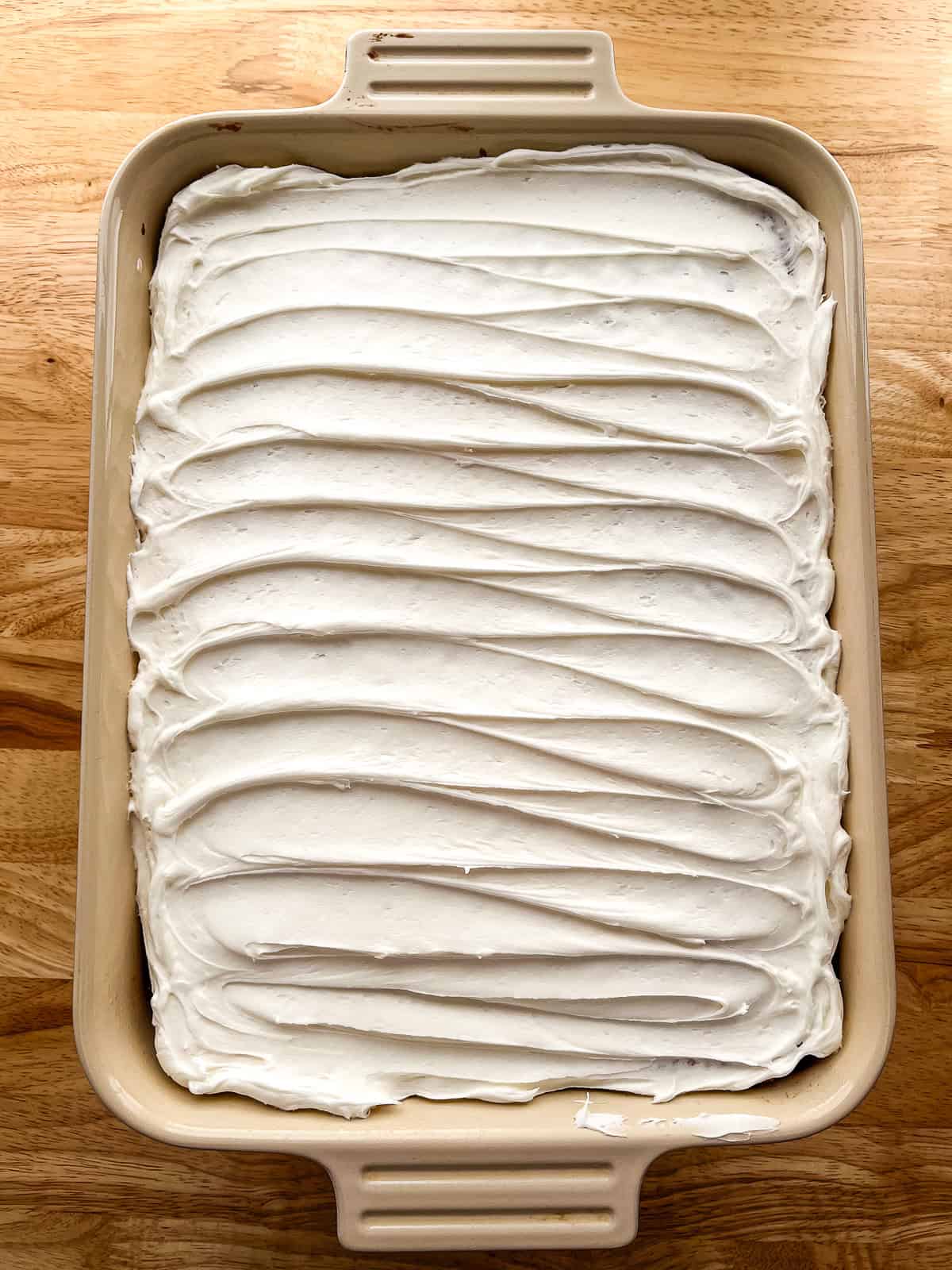 Eggless vanilla cake in a pan.