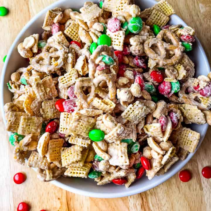 Bowl of Christmas Chex mix in a bowl.